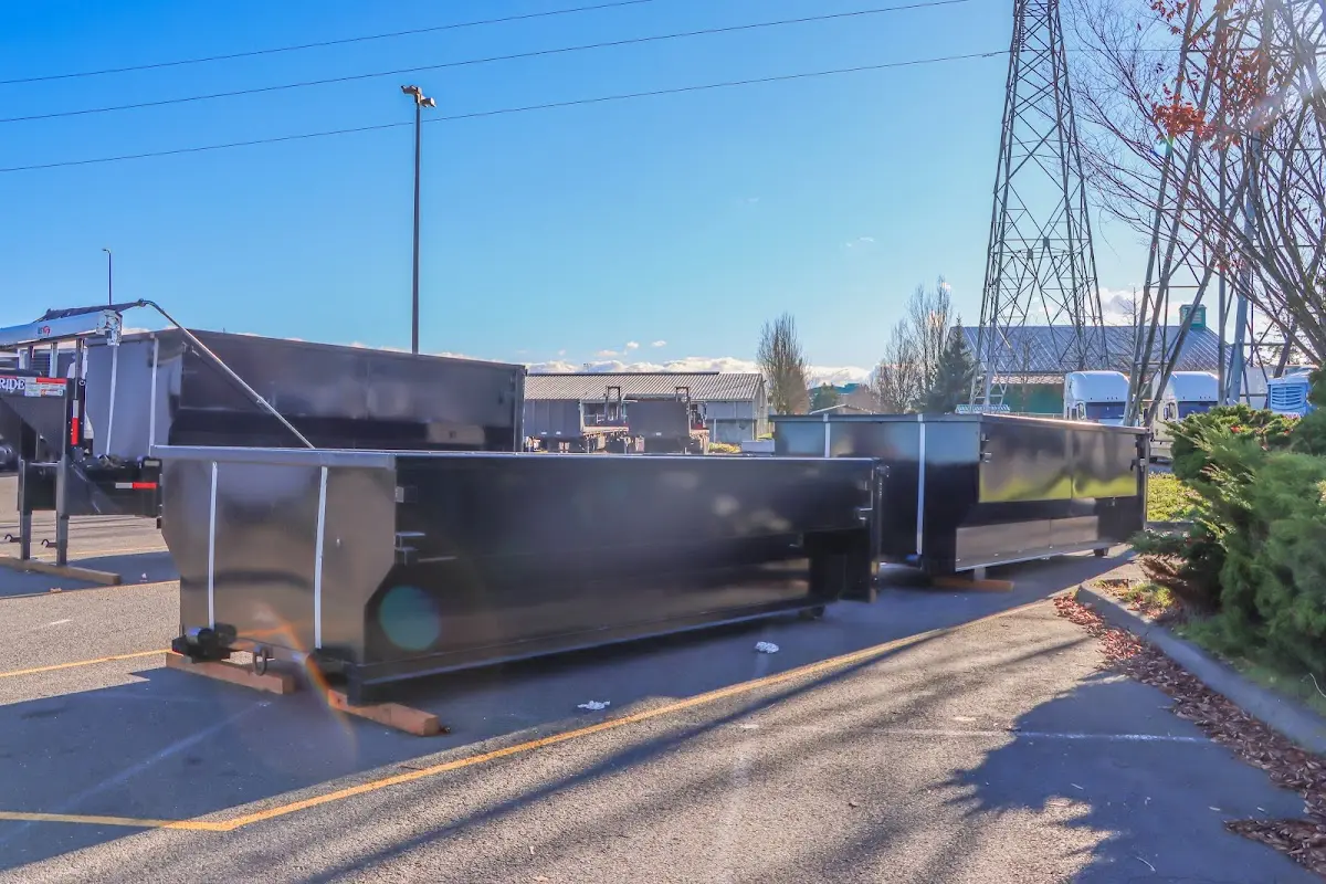 Roll-off dumpster ready for waste disposal at job site for Yard Waste Dumpster Rental in Margate